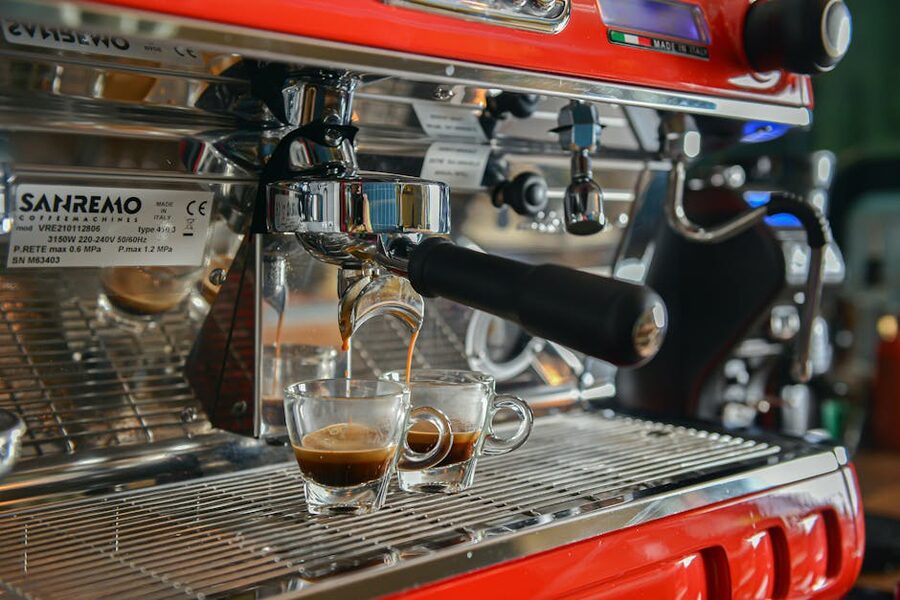 Italian espresso being poured into cups at a cafe