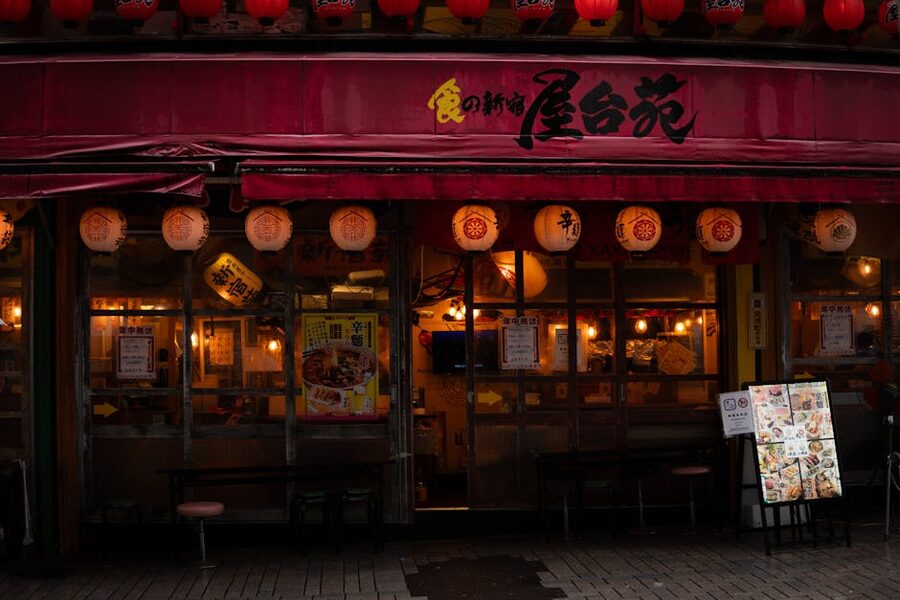 Japanese restaurant with red lanterns at night