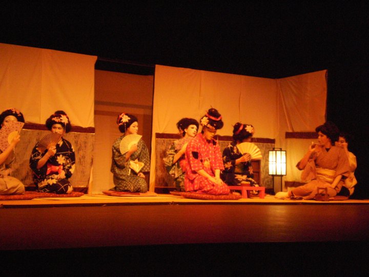 Kabuki performance actors on stage in elaborate traditional costume