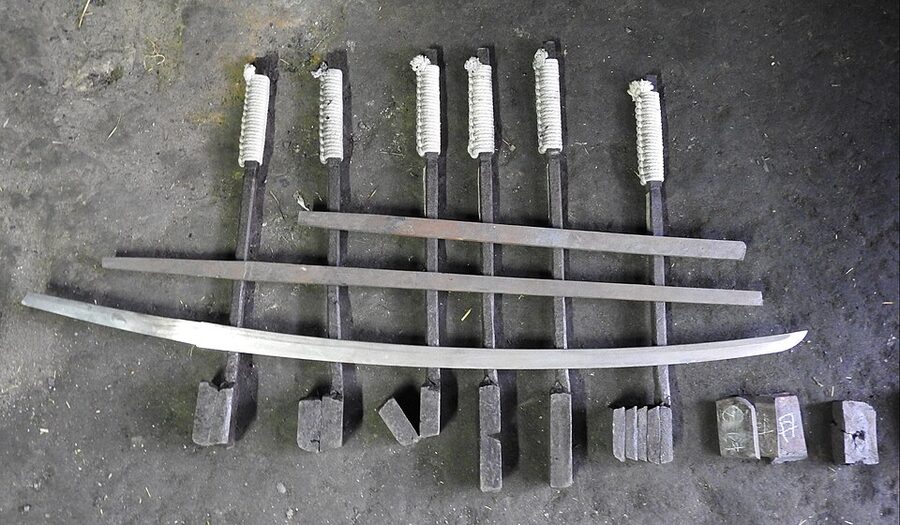Katana forging process from steel blocks display