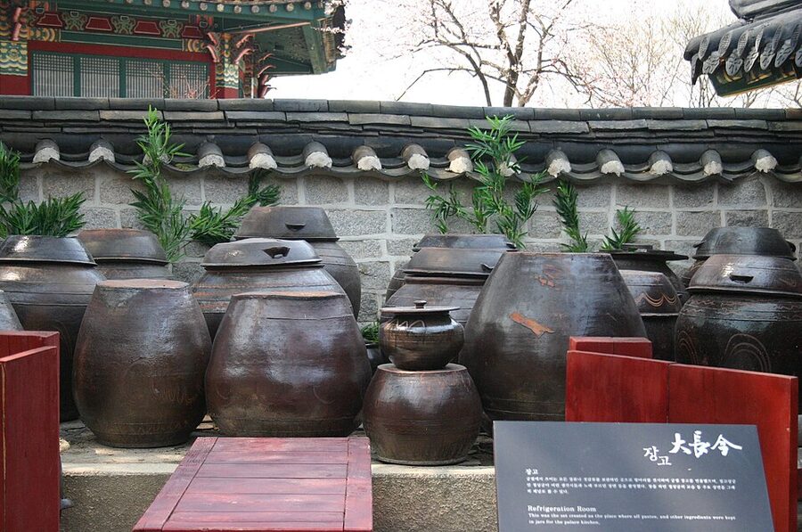 Thatched-roof village setting at Dae Jang Geum Park