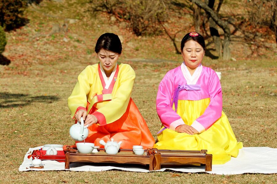 Korean women in hanbok during tea ceremony