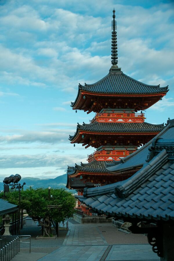 Red pagoda at Kiyomizu-dera Temple with clear blue sky in Kyoto