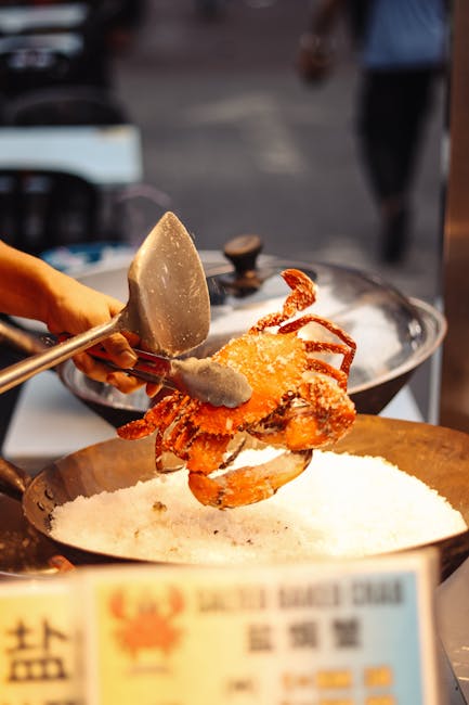 Salted egg crab being prepared at a Kuala Lumpur street food stall
