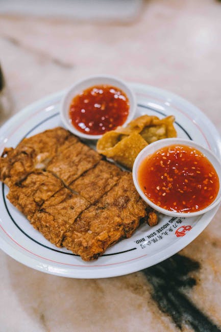 A delicious Malaysian chicken dish served with spicy chili sauce in Kuala Lumpur