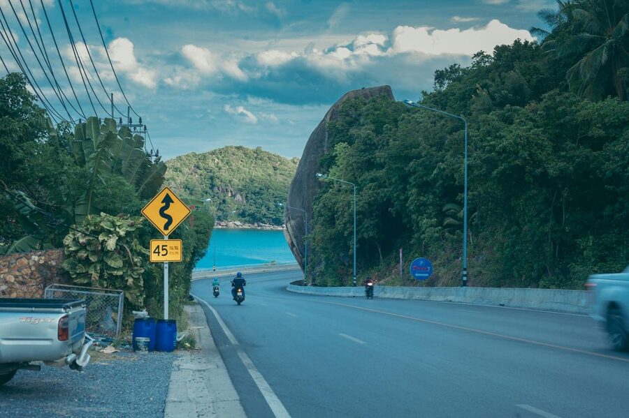 Scenic coastal road winding through Koh Samui Thailand