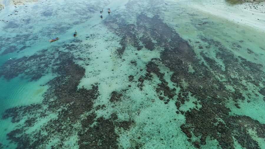 Aerial view of coral reefs near Thai coastline