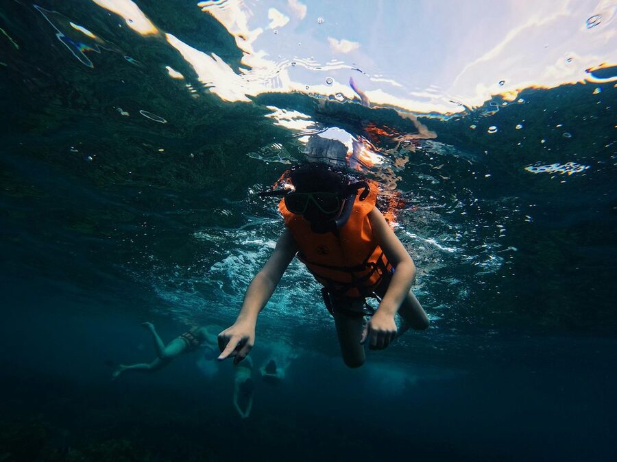 Snorkeling in clear Thai waters with tropical fish