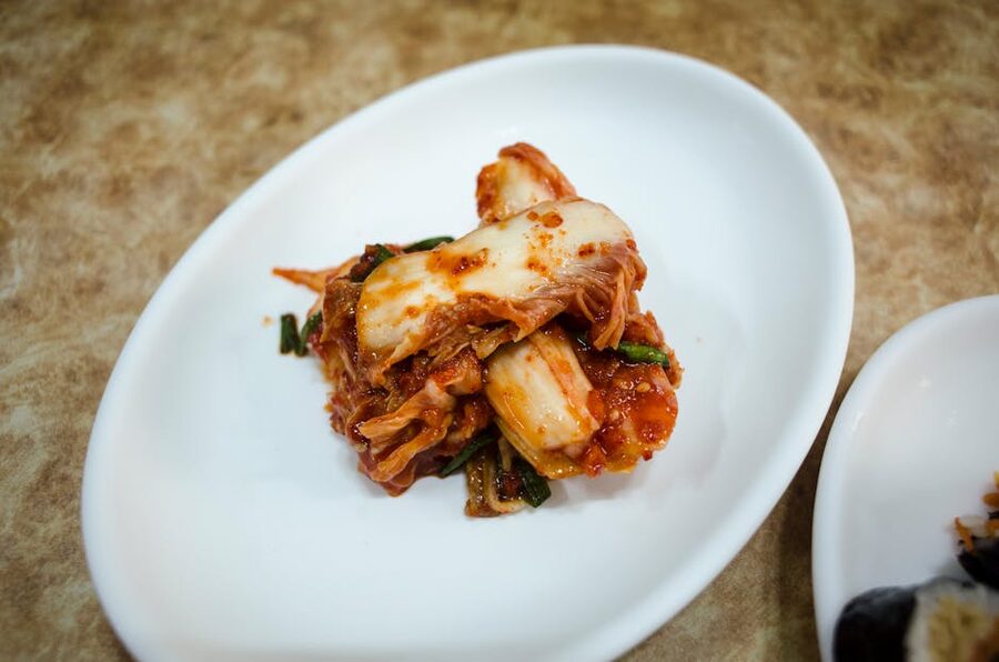 Plate of traditional fermented Korean kimchi in a white dish