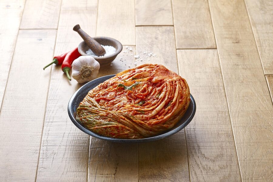 Home-made Korean kimchi platter with cabbage and radish varieties