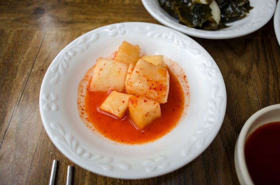 Spicy Korean radish kimchi kkakdugi with red chilli paste