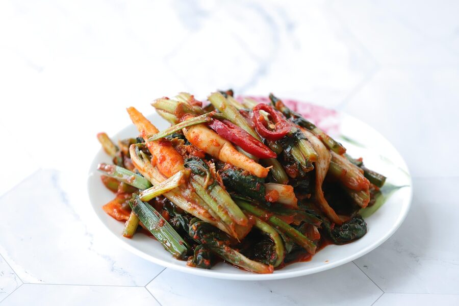 White baek kimchi with green onions in Korean cuisine