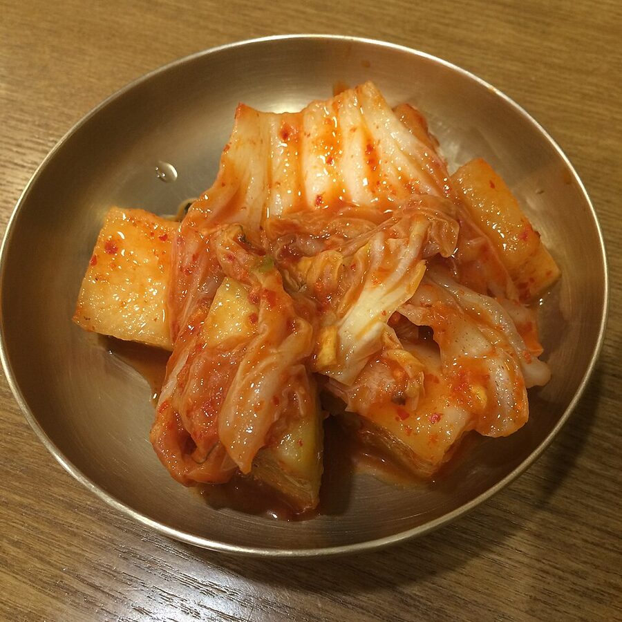 Baechu gimchi and kkaldugi side by side in Korean cuisine
