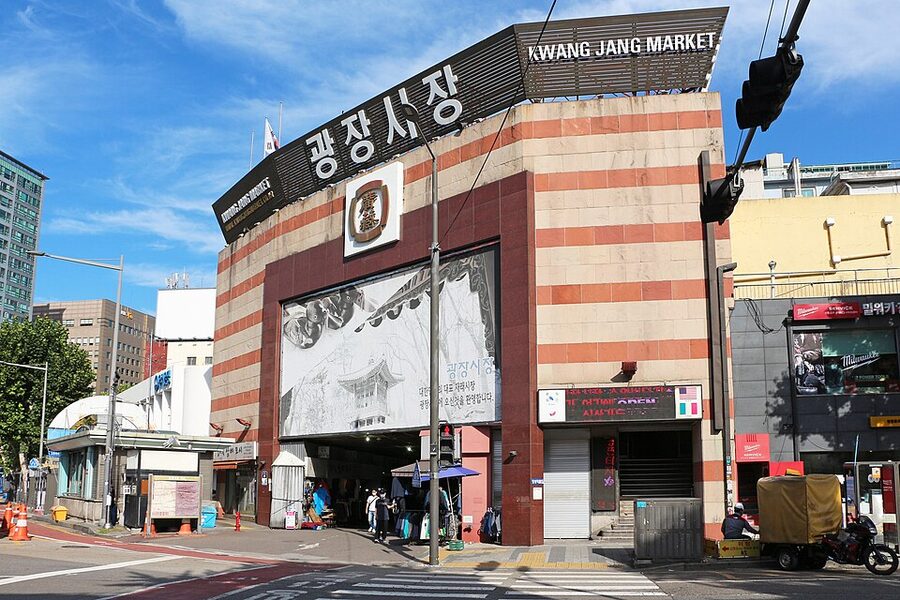 Gwangjang Market in Seoul with rows of stalls and cooked food