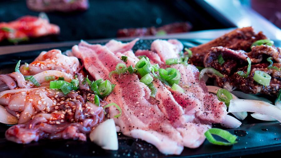 Korean BBQ table with grilled meat