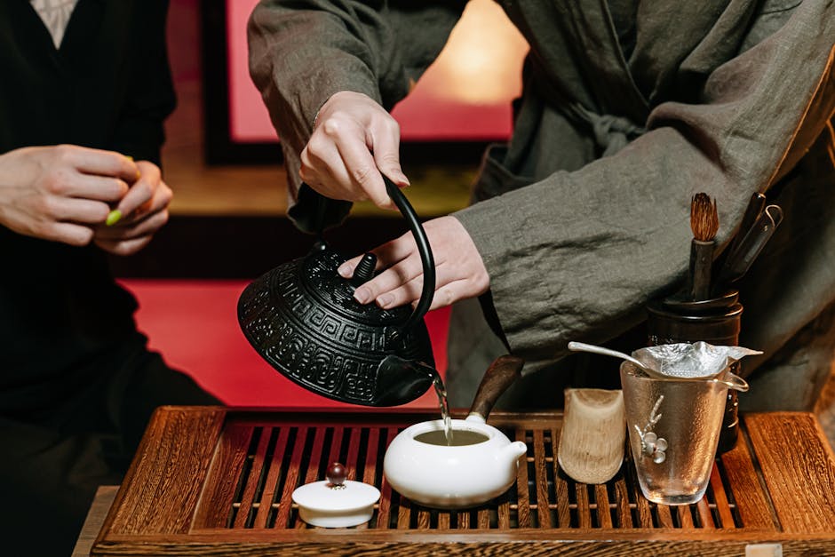 Korean tea being poured from ceramic teapot