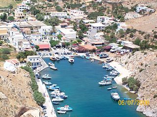 Vathi fjord on Kalymnos with valley village and orange groves