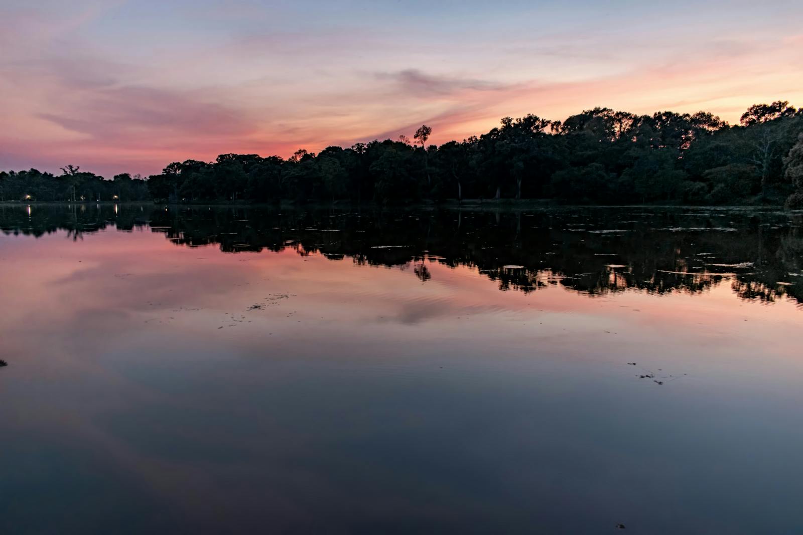 A calm sunset over Tonle Sap lake in Siem Reap Cambodia