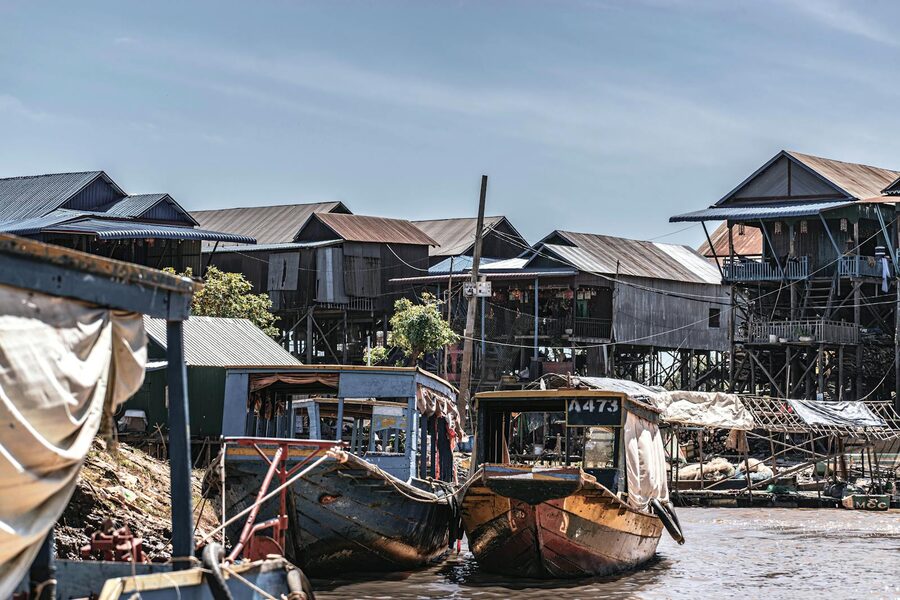 Wide view of Kampong Phluk village stilt houses in the dry season
