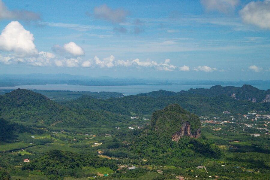 Aerial view of Krabi Thailand showing mountains coastline and lush vegetation