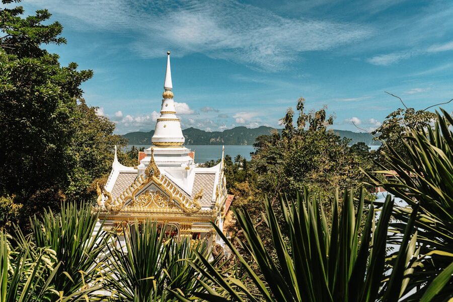 Buddhist temple surrounded by lush greenery in Krabi Thailand