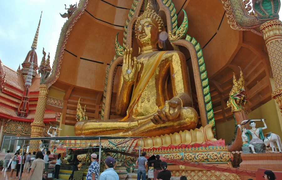 Golden Buddha statue at Tiger Cave Temple Wat Tham Sua in Krabi