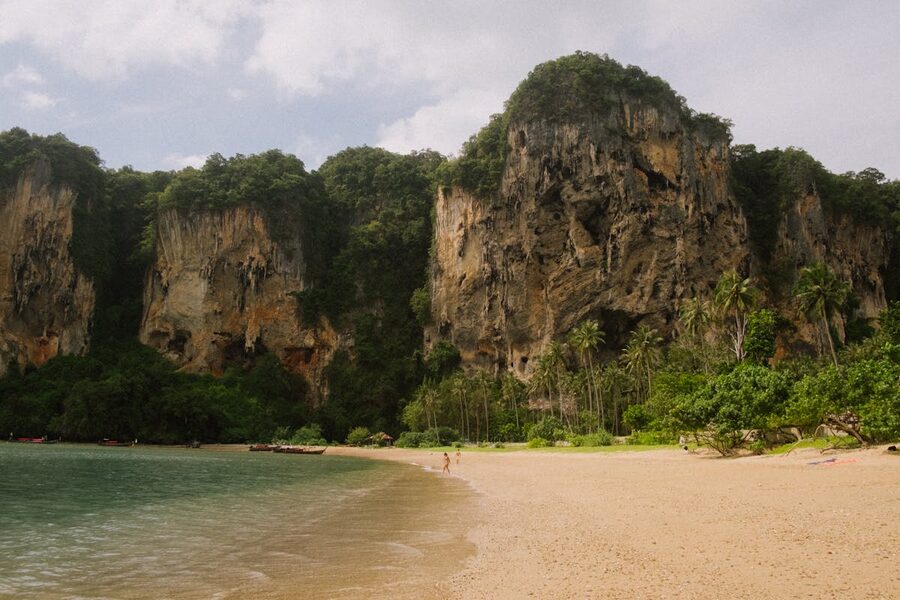 Ton Sai Beach with dramatic limestone cliffs in Krabi Thailand