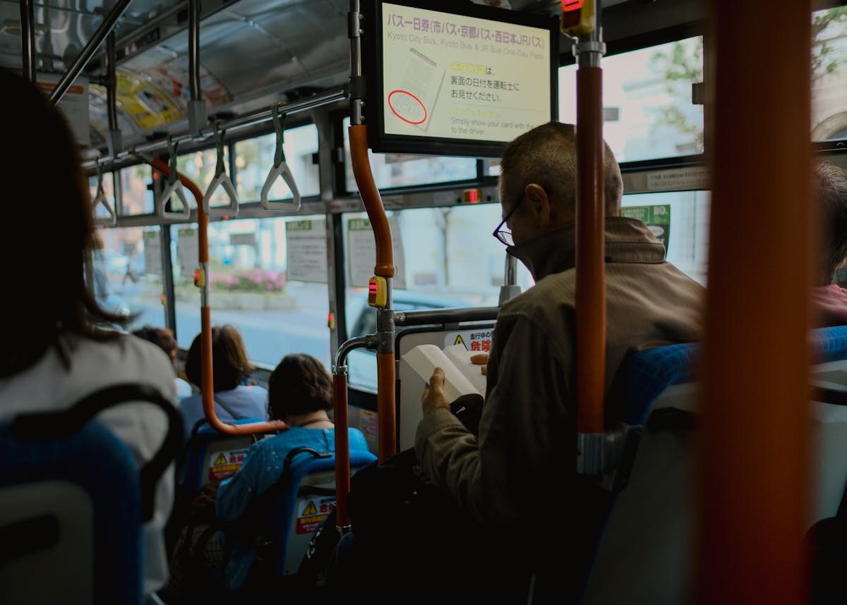 Passengers sitting on a bus in Kyoto