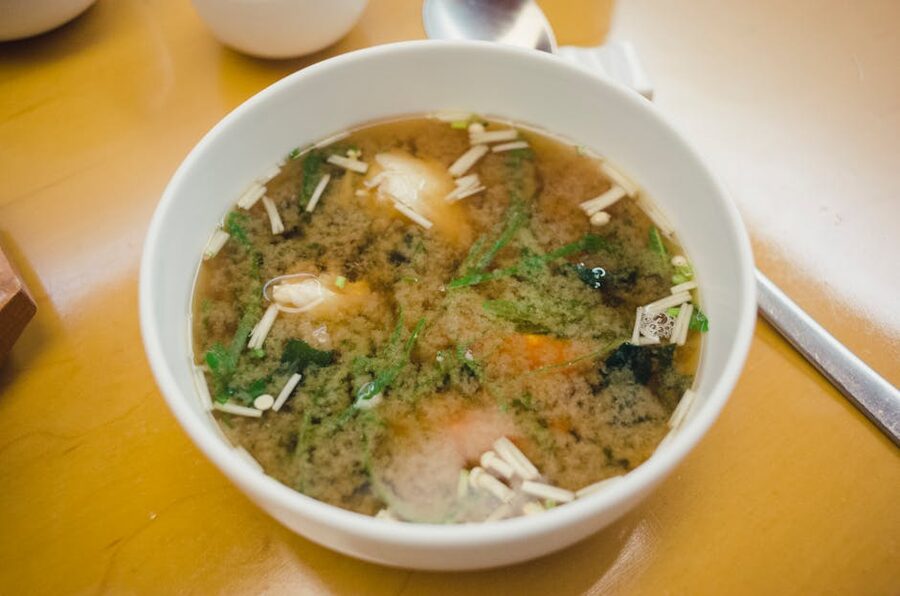 Close-up of miso soup in a white bowl