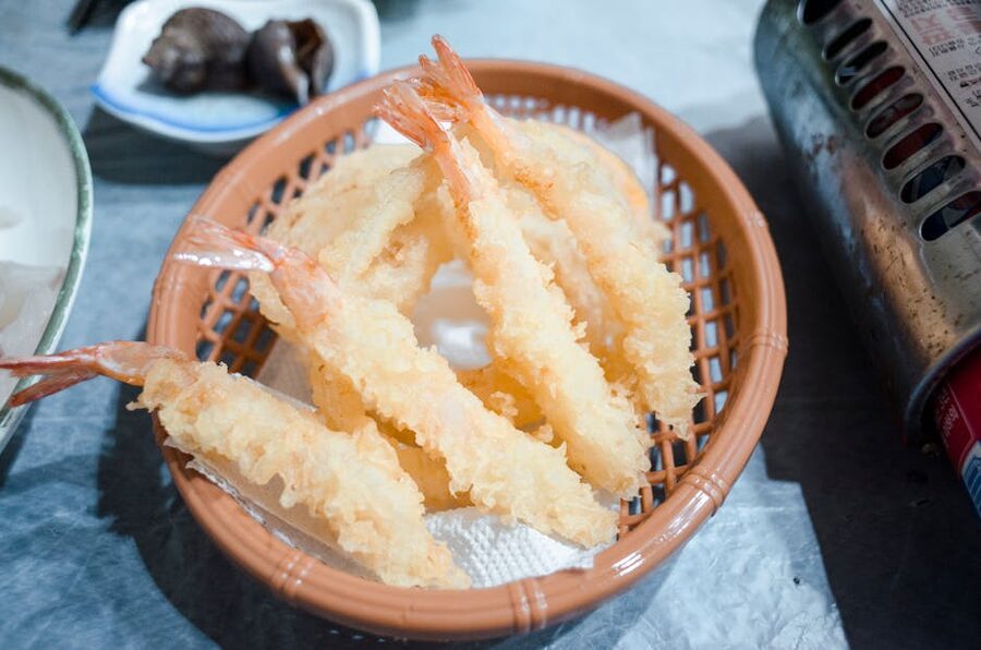 Shrimp tempura served in a woven basket