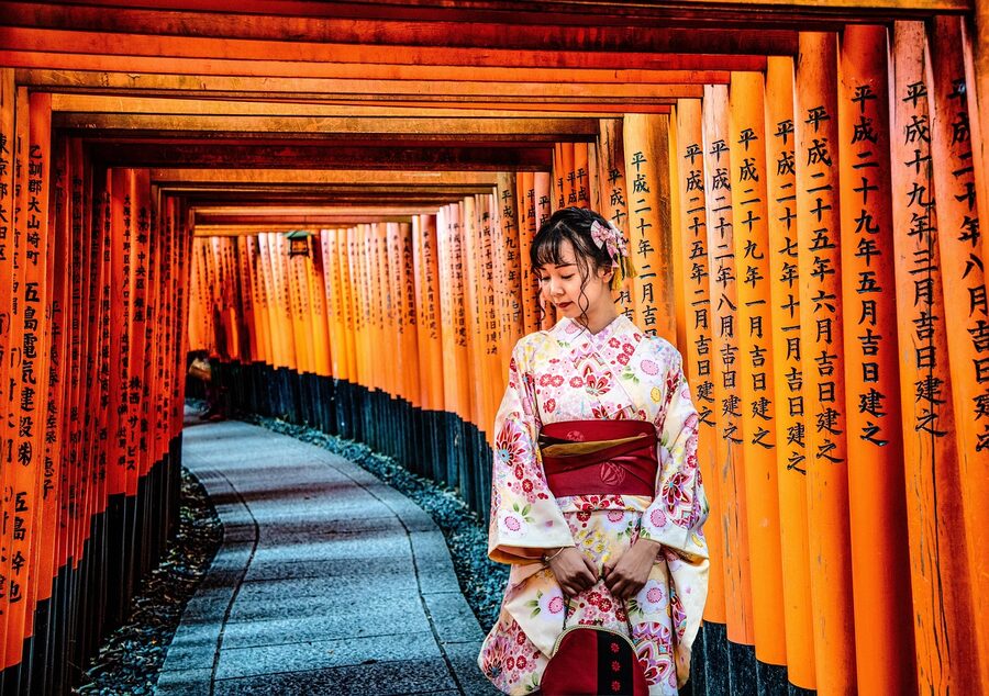 Geisha performing with traditional fan Kyoto