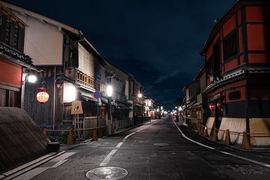 Historic Kyoto street at night with traditional buildings