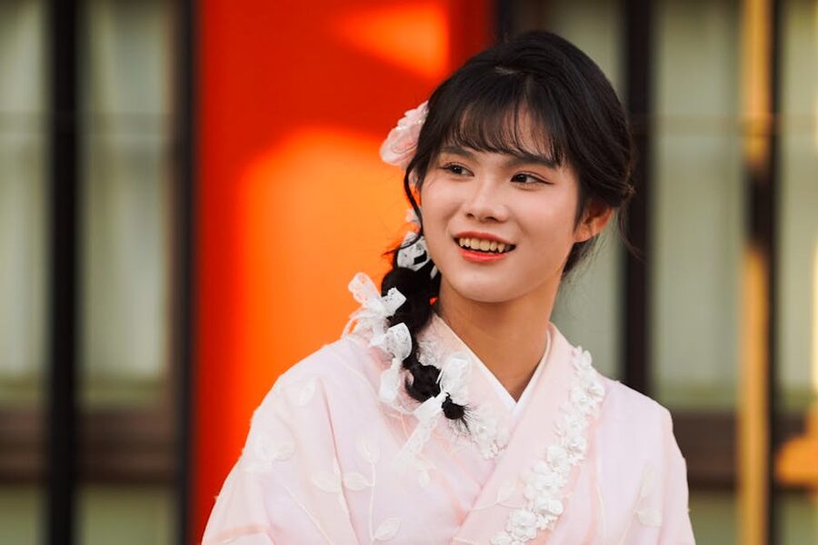Young woman in pink kimono portrait in Kyoto