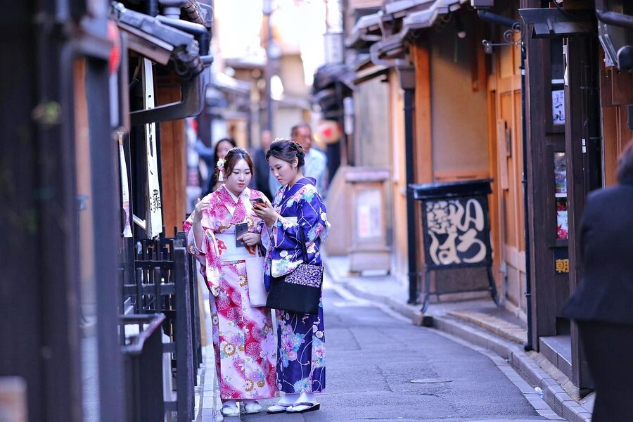 Women in kimono walking Kyoto street