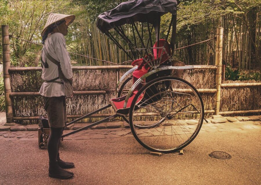 Rickshaw waiting on scenic Kyoto path