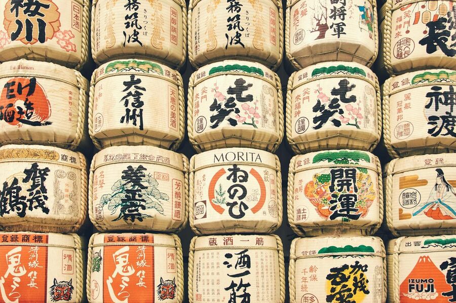 Colorful display of traditional Japanese sake barrels