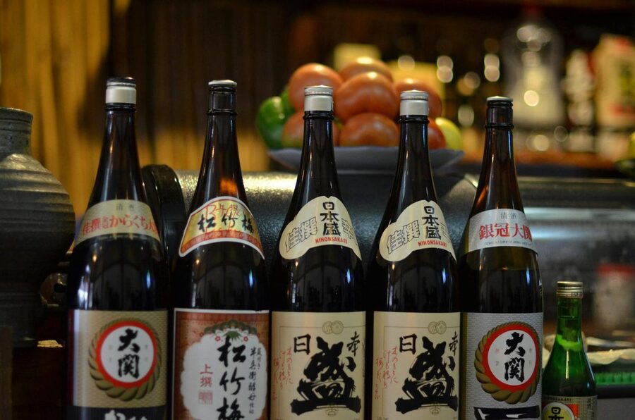 Traditional sake bottles displayed at a Japanese restaurant