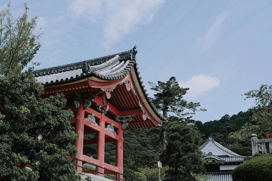 Traditional pagoda surrounded by trees in Kyoto