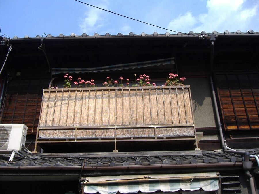 Traditional Kyoto machiya townhouse with wooden lattice facade