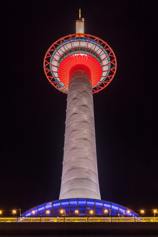 Kyoto Tower lit at night from below