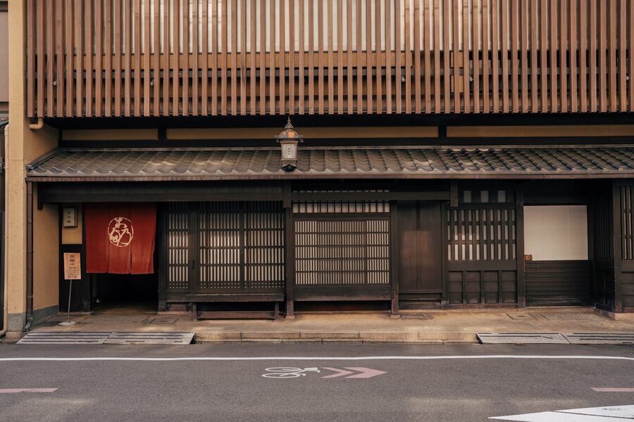 A traditional wooden building facade in Kyoto showing classic Japanese architectural details