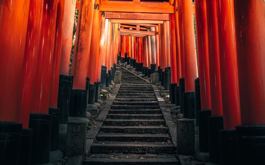Red torii gates pathway at Fushimi Inari Shrine in Kyoto