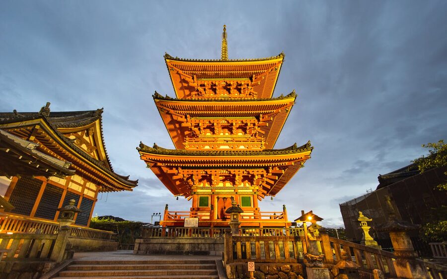 Kiyomizu-dera temple illuminated at night in Kyoto