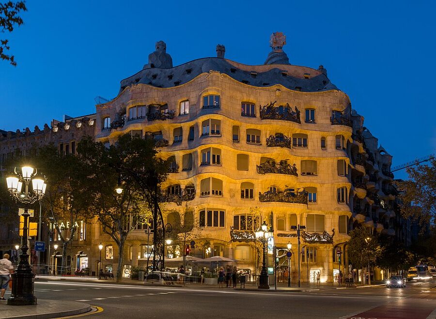 Casa Mila La Pedrera illuminated facade at night Barcelona
