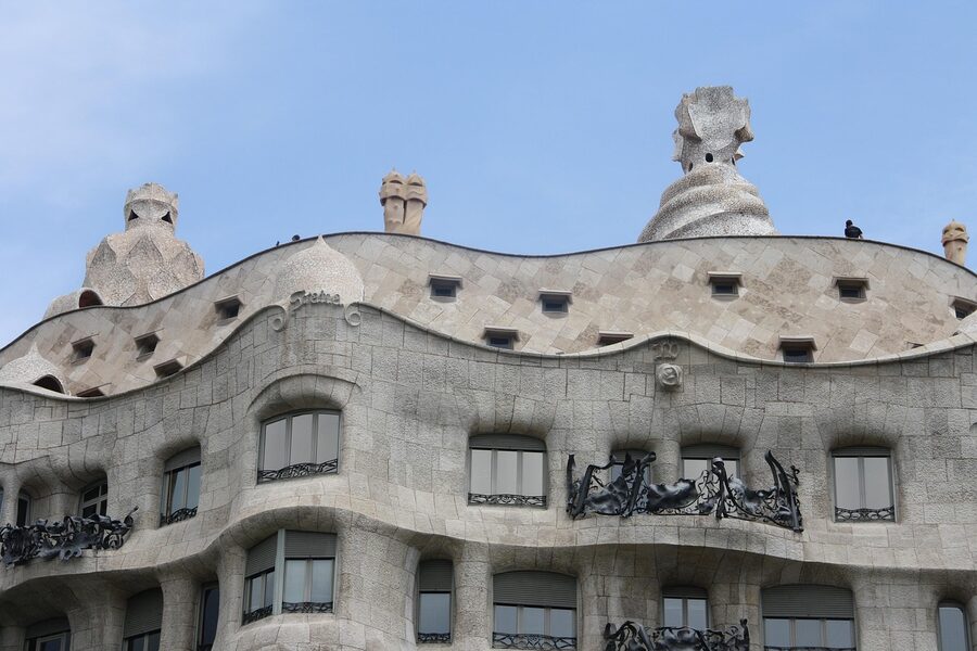 Casa Mila La Pedrera at dusk on Passeig de Gracia Barcelona