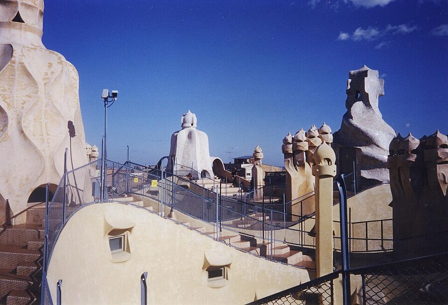 La Pedrera rooftop chimneys with the Barcelona skyline behind