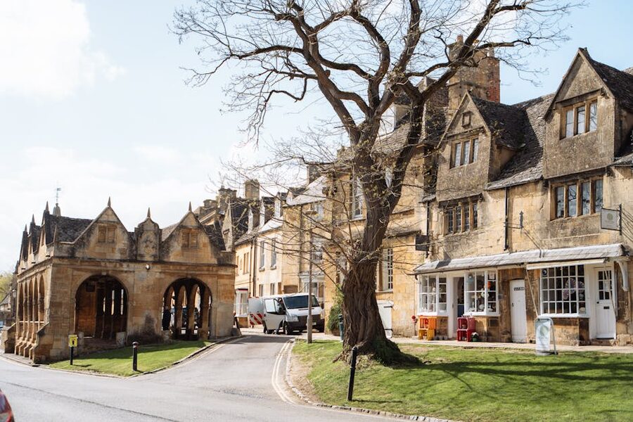 Stone cottages and market hall in an English village