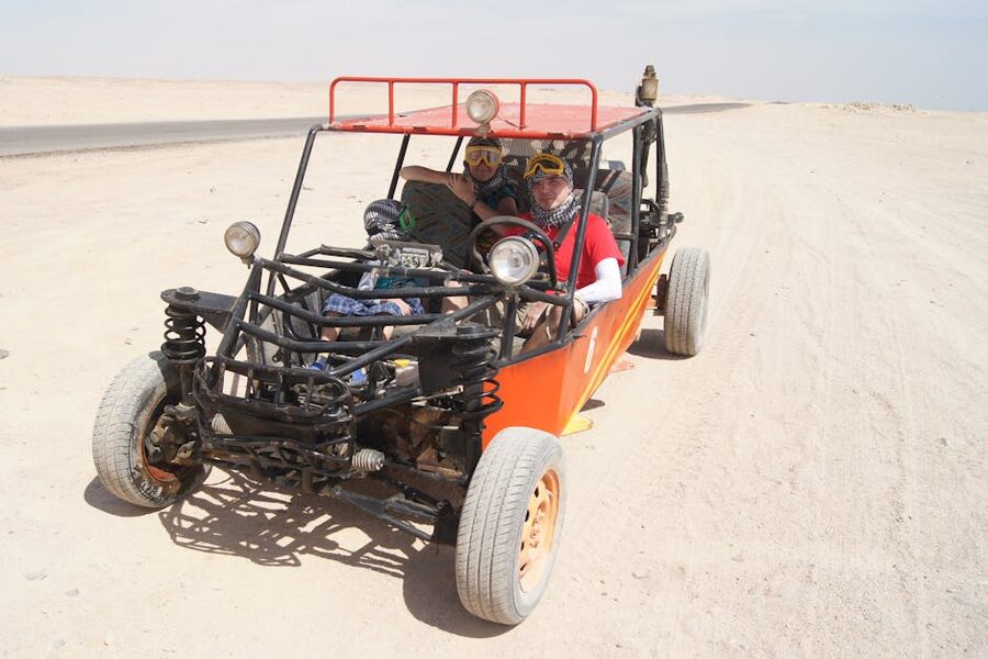 Open off-road buggy on a dust track