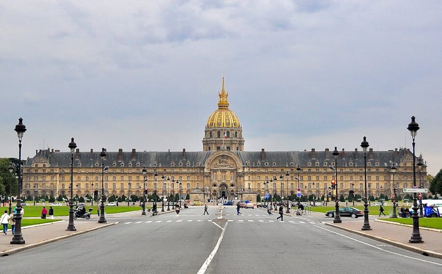 Les Invalides seen from street with pedestrians