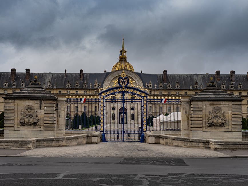 Ornate gates and golden dome of Les Invalides